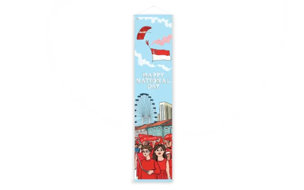 National Day banner with design of Singapore city background and red parachute